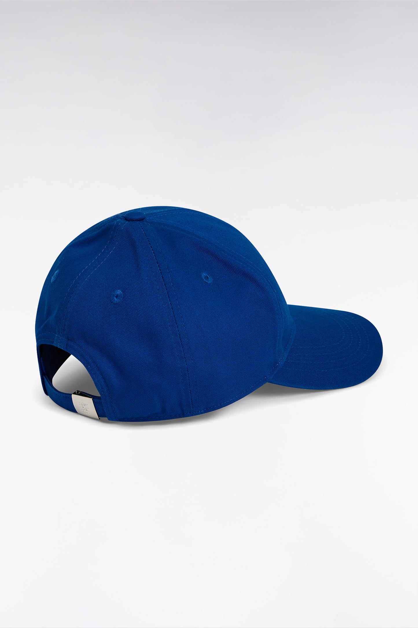 Casquette unie en twill de coton marine broderie nœud papillon