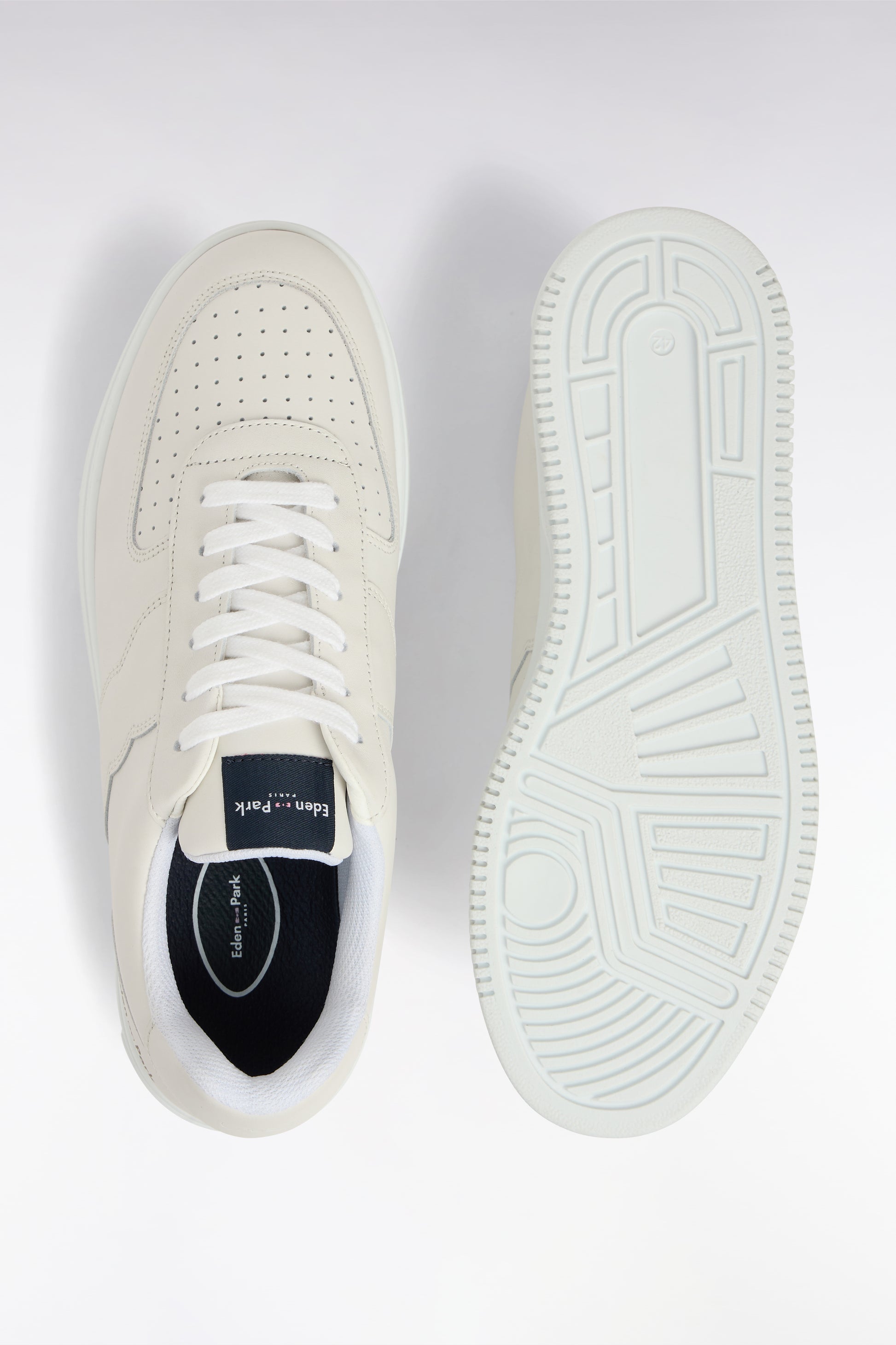 Sneakers en cuir perforé blanches