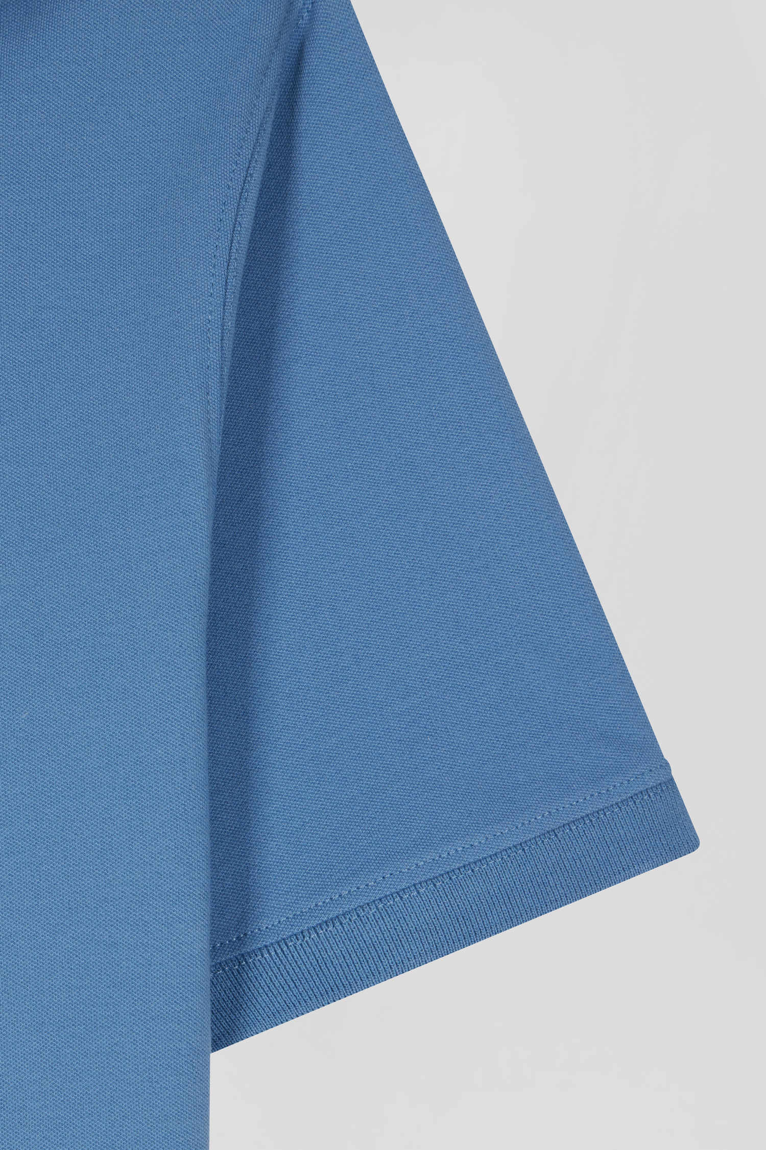 Polo manches courtes en coton stretch bleu coupe Slim