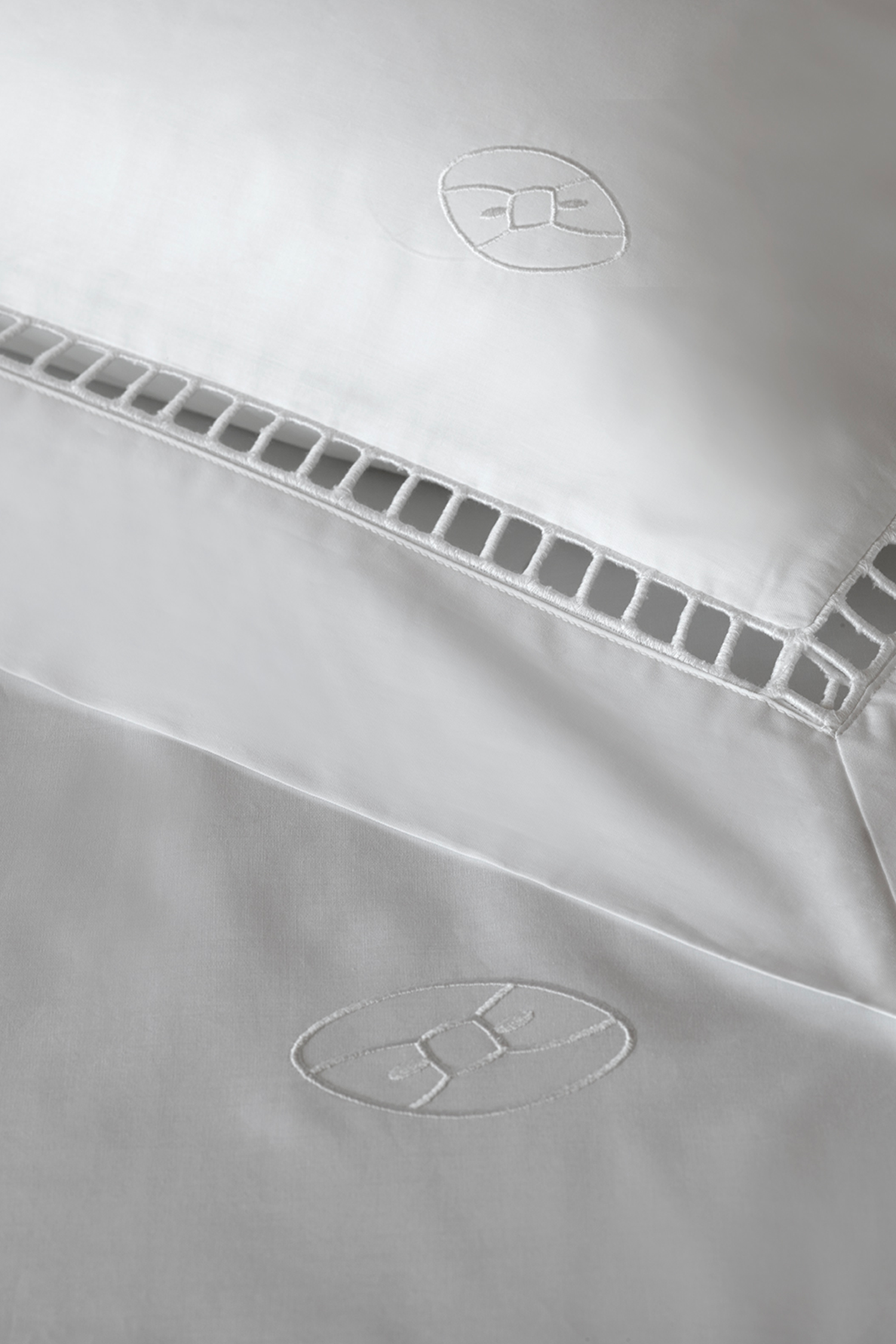 duo of square white pillow case