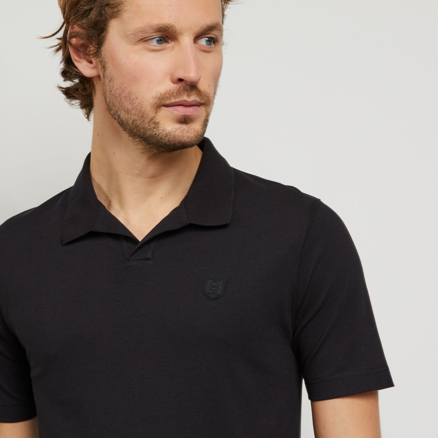 Polo noir en coton piqué